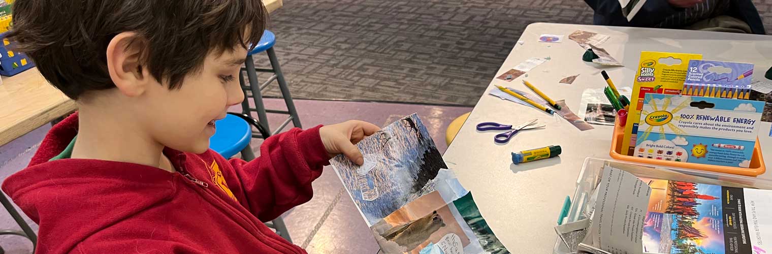 young boy creating art