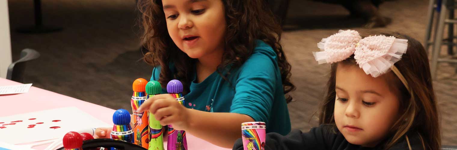 young girls creating art