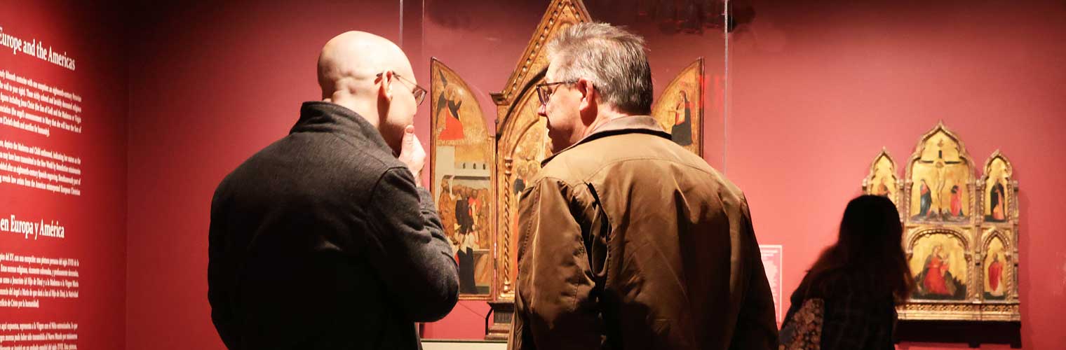 two men talking about the pieces in Payne Hurd